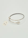 The Lotus Bud Bypass Sterling Silver Bangle