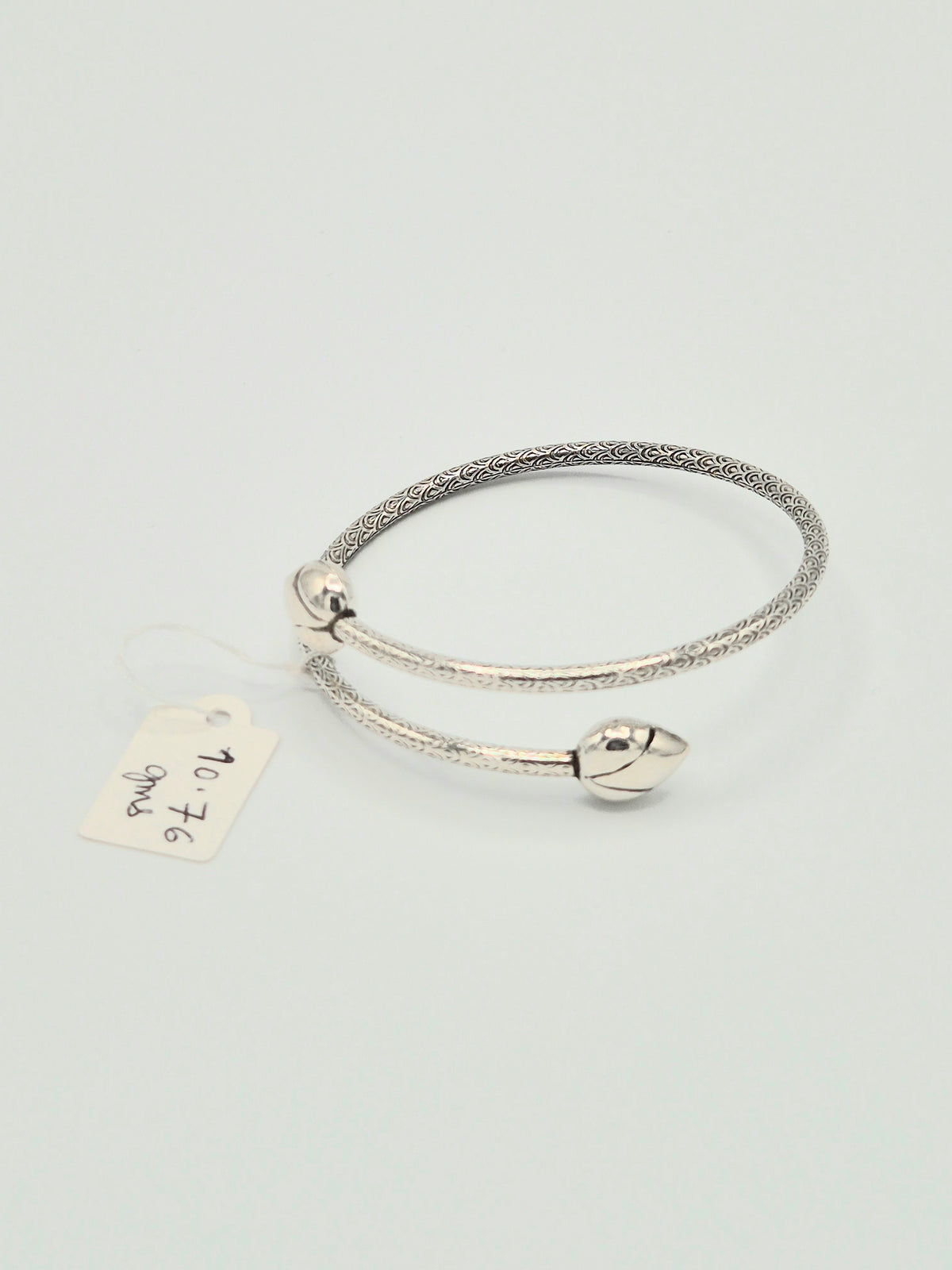 The Lotus Bud Bypass Sterling Silver Bangle